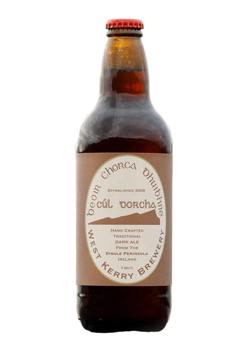 Bottle of West Kerry Brewery beer with a label on a white background
