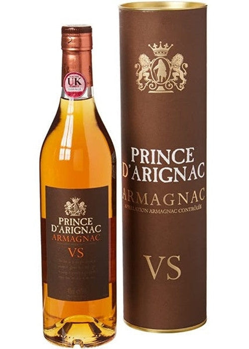Prince D'Arignac Armagnac VS 700ml bottle with copper cap and crest label beside brown gift tube