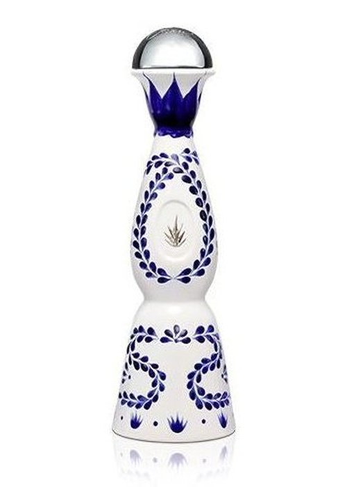Clase Azul Reposado tequila bottle with white ceramic blue floral design and silver dome cap