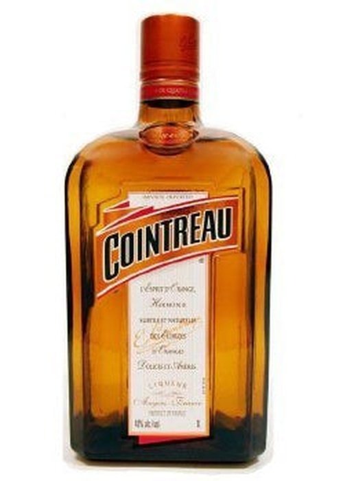 Cointreau 700ml clear orange liqueur bottle with red neck band and white label
