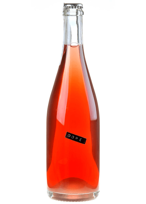 Dope Claus Preisinger sparkling wine bottle with orange-red liquid and silver crown cap