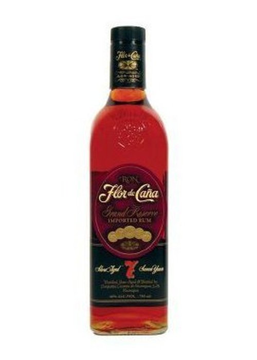 Flor de Cana Grand Reserve 7 Year Old dark golden rum bottle with red and black label