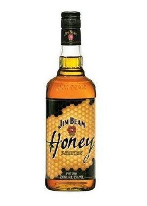 Jim Beam Honey bourbon bottle with honeycomb label and amber liquid