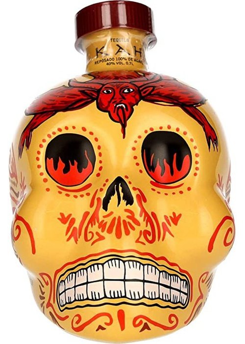 Kah Reposado 700ML tequila bottle in sugar skull design with yellow, red and black Day of the Dead artwork