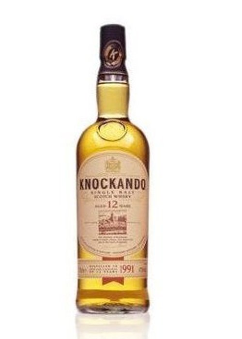 Knockando 12 Year Old Single Malt Scotch Whisky bottle with golden-amber liquid and cream label
