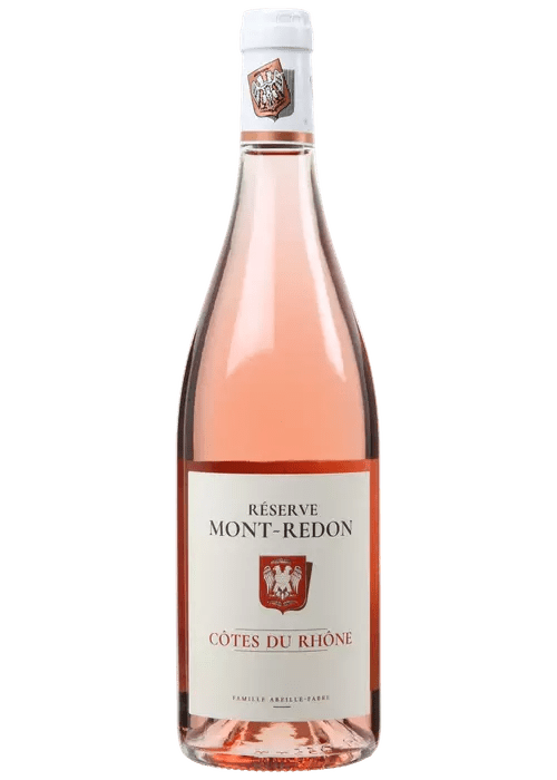 Mont-Redon Reserve Cotes Du Rhone Rose wine bottle with white label and red shield emblem