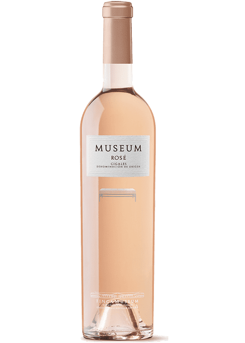 Finca Museum Rose wine bottle with pale pink liquid and white label
