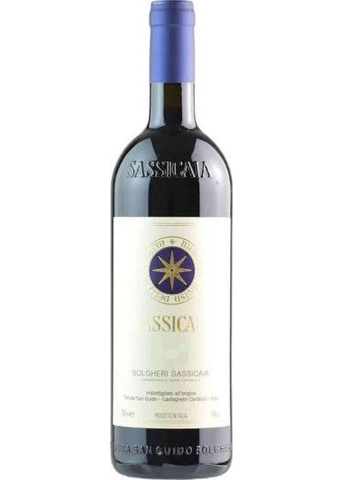 Sassicaia 2022 red wine bottle with cream label and gold star emblem