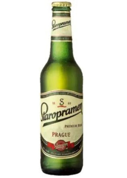 Staropramen 500ml green glass bottle with cream label showing Prague lager beer