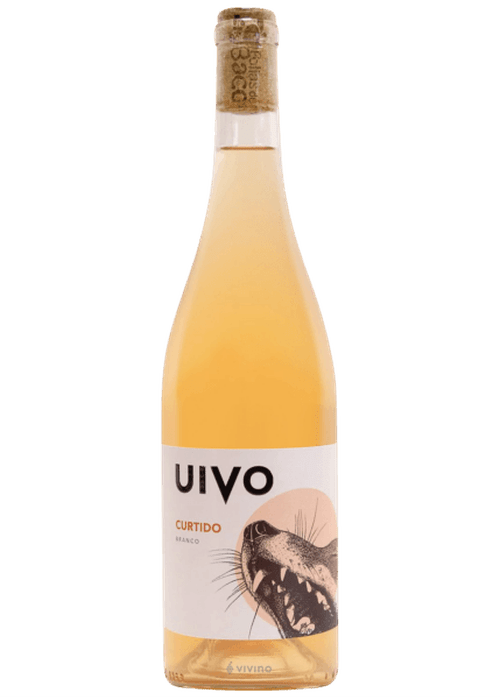Uivo Curtido orange wine bottle with animal illustration label